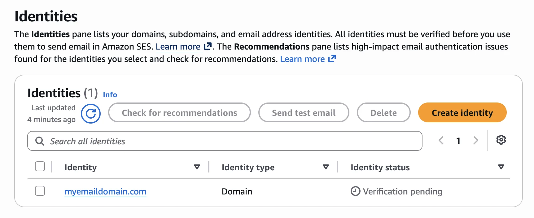 SES Identities list showing the new email and domain pending verification